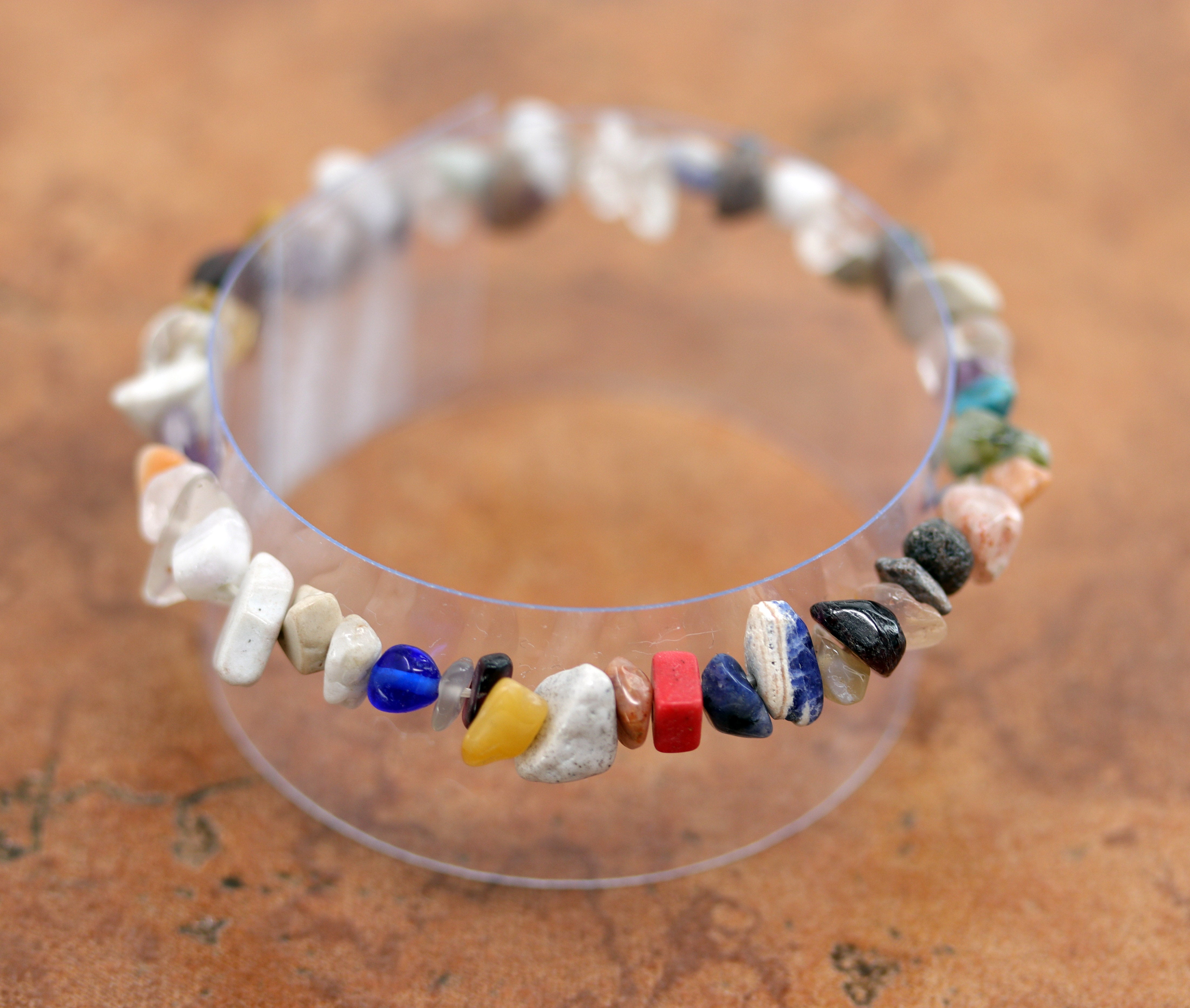 A beautiful bracelet with different stones and nuggets. It fits sizes 6" (more loose) to about 7" (tighter fit). The width is 1/2".