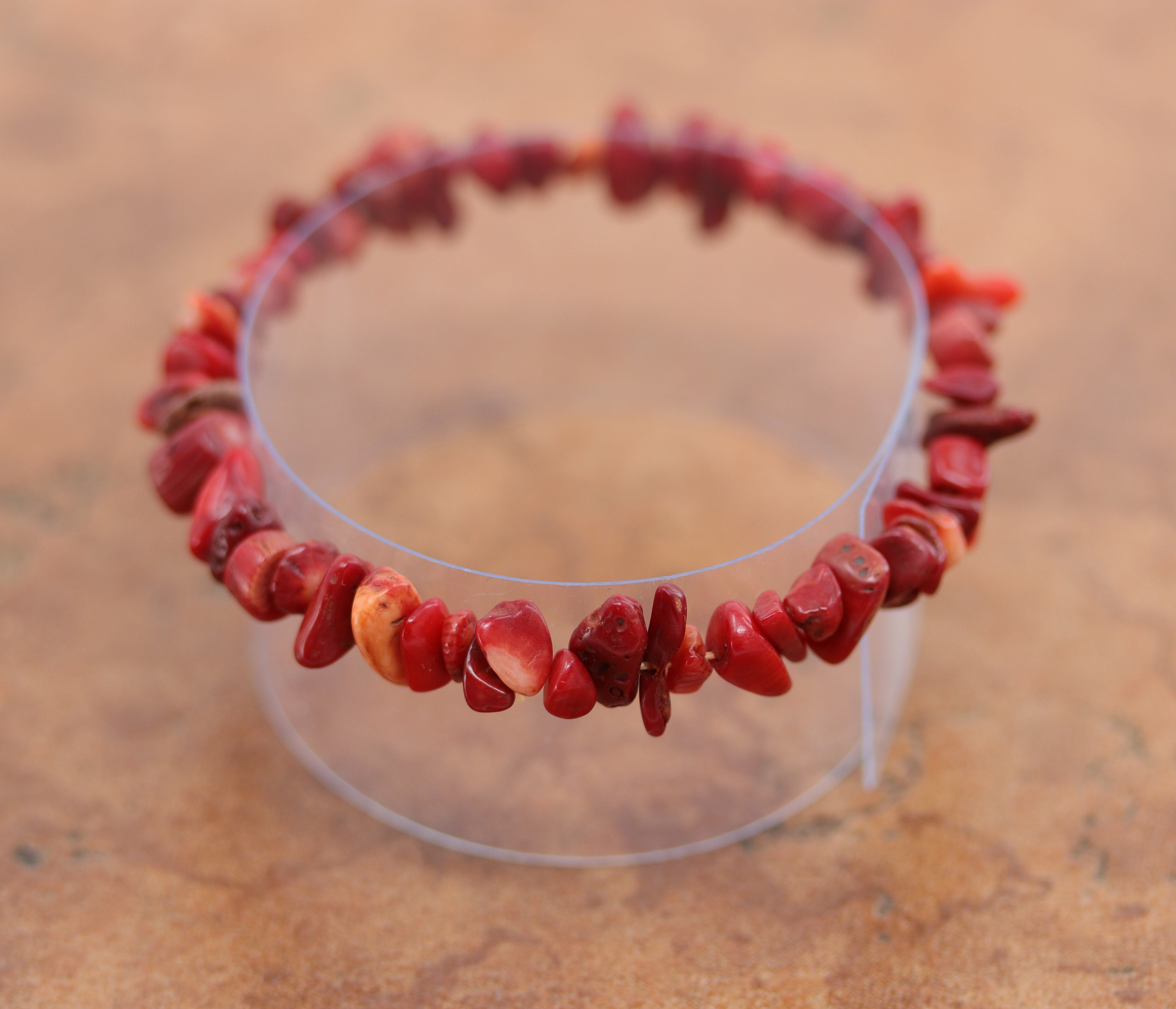 Unique bamboo coral chip bracelet that&nbsp;fits sizes 6" (more loose) to about 9" (tighter fit). The width of the bracelet is 1/2". 