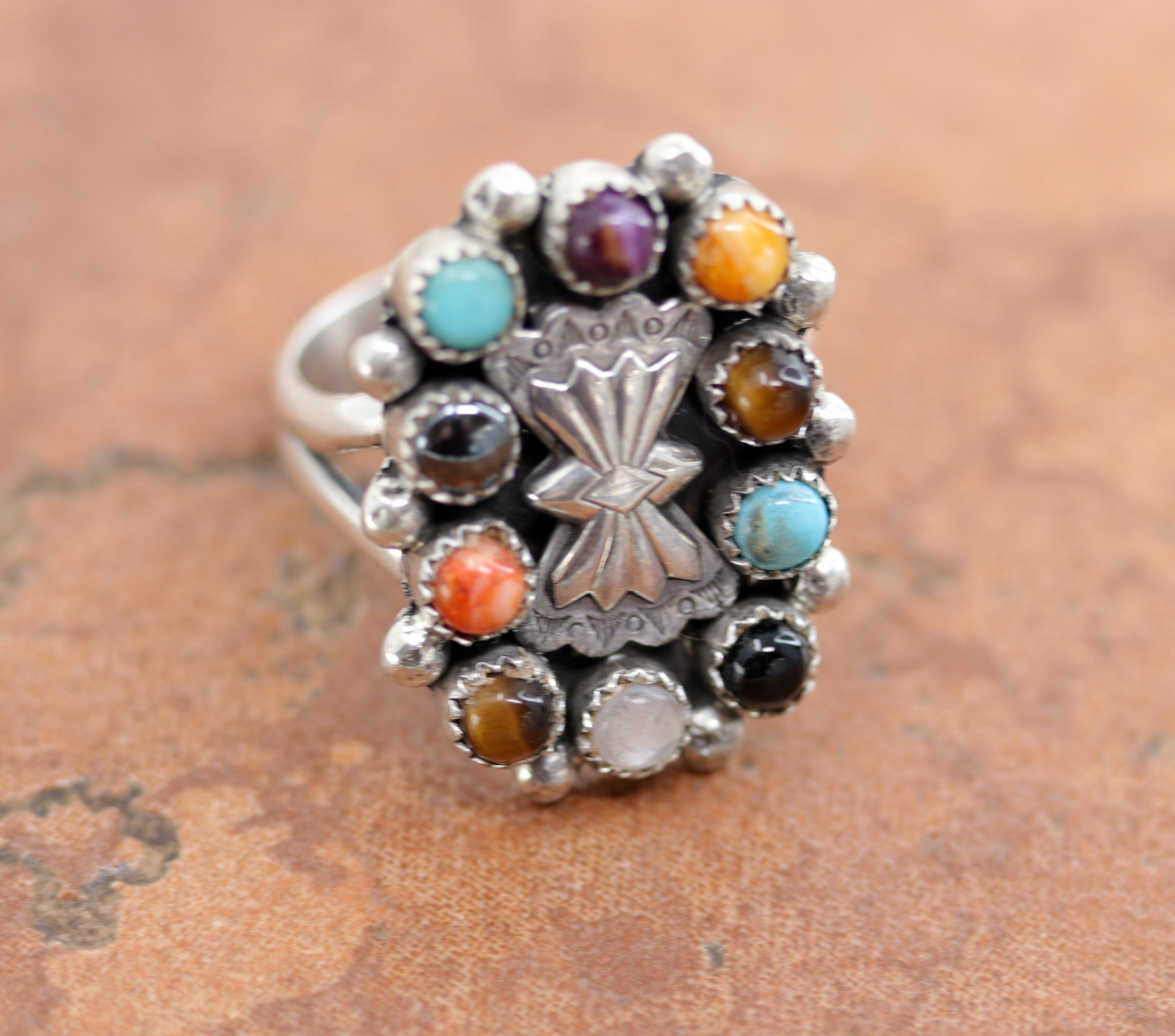 Navajo Native American ring. It is made from sterling silver and multi-stone inlay. The ring size 11 1/2 and it is 1 1/4" in length.