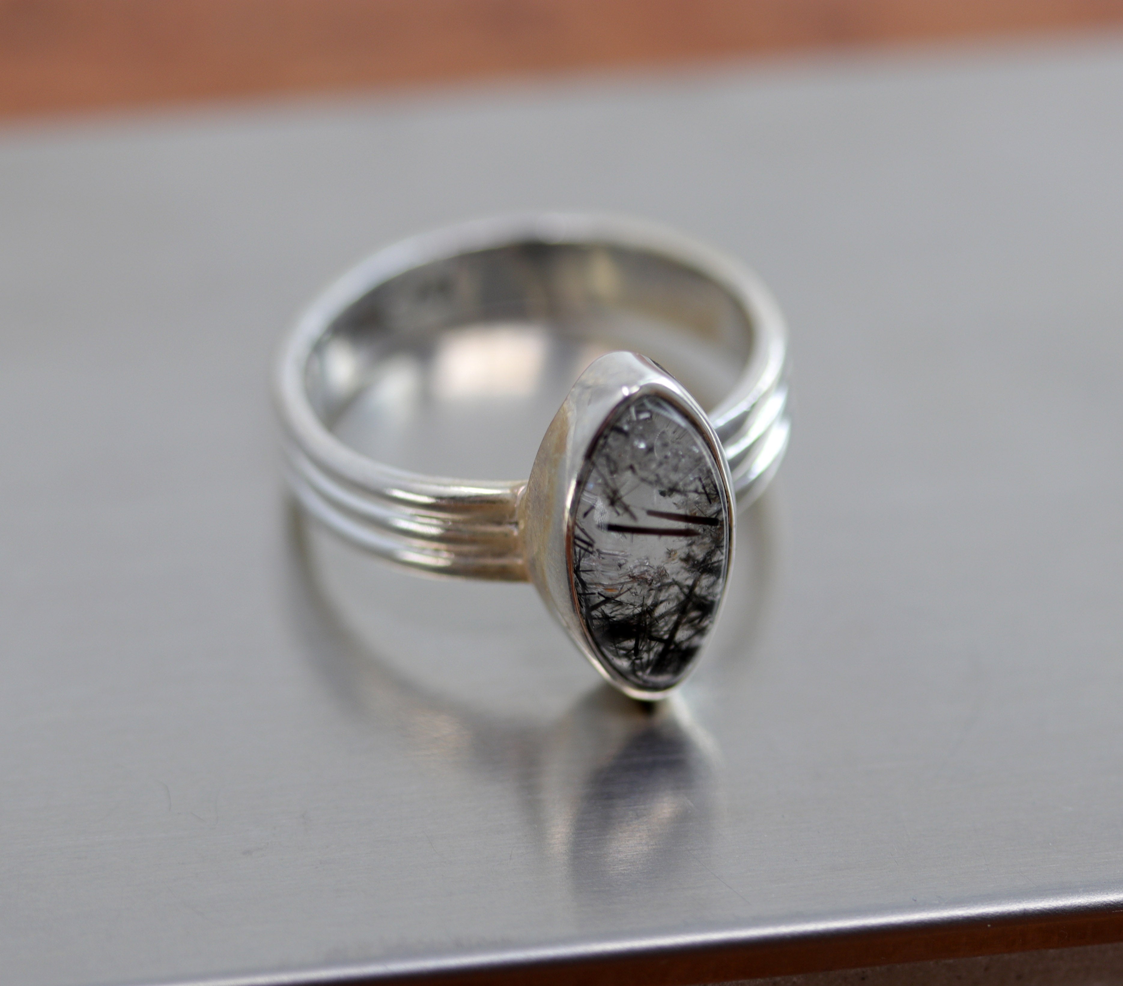 A beautiful Southwest Style gemstone ring made from sterling silver and herkimer diamond. The ring size is 7 1/2 and it is 5/8" in length. 