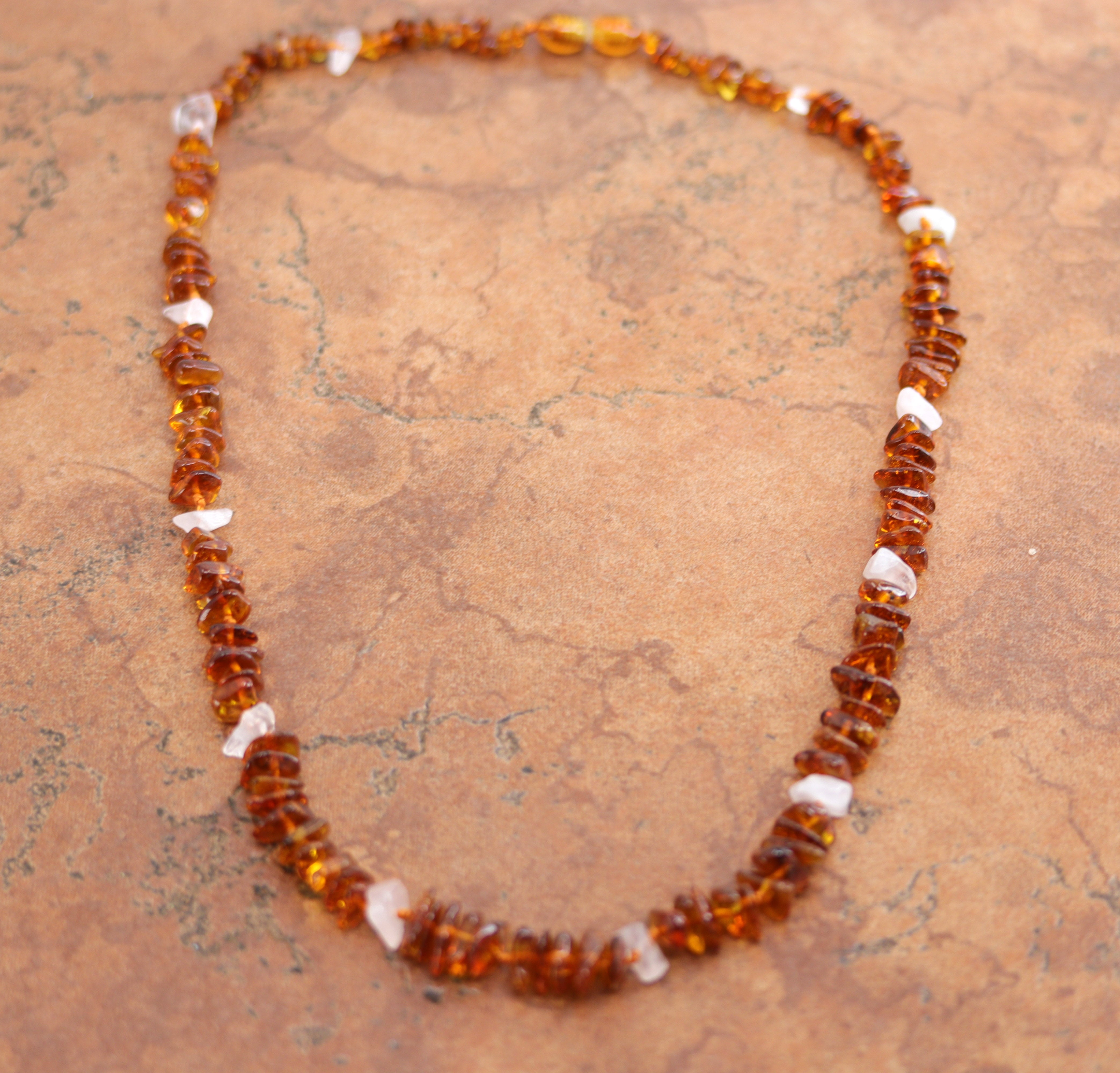 Beautiful necklace with amber that comes from the Baltic Sea. The necklace is about 20" in length, and about 1/2" wide. 